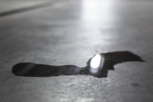 istock Puddle of Water, Car, Asphalt, Parking 882809722