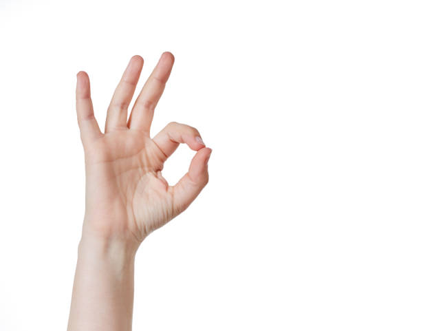 istock Hand gives the 'A OK' sign against white 882809790