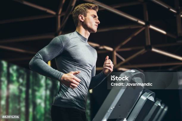 Man Running At The Gym Stock Photo - Download Image Now - Men, Gym, Health Club