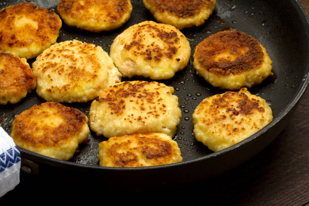 istock Homemade cheese pancakes in the pan 882825260