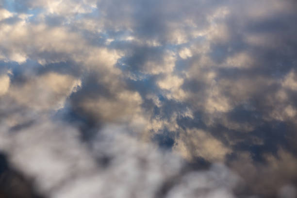 istock Puddle of water, Reflection of the sky 882825276