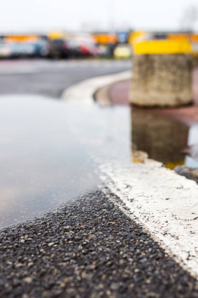 istock Puddle of water, Reflection of the sky 882825320