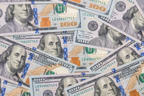 istock 100 new us dollar banknotes as background 882830112