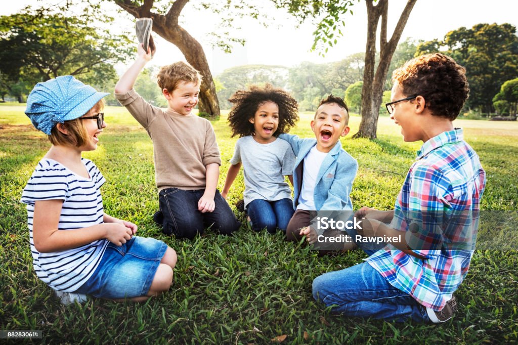 Happy kids in the park Child Stock Photo
