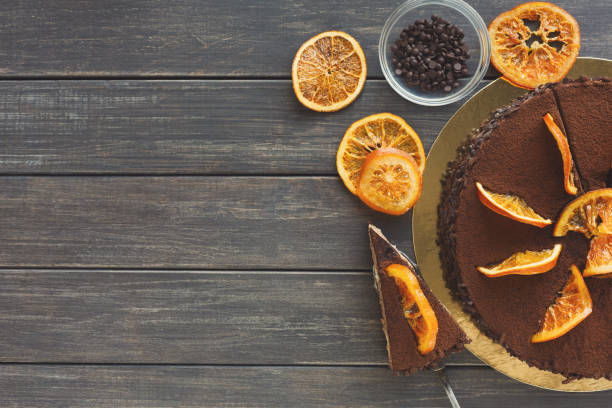 istock Chocolate cake with cream and profiterole 882835868
