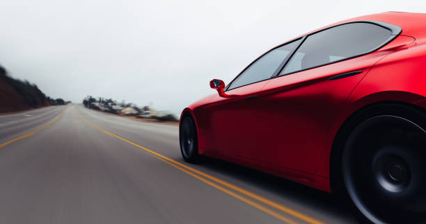 auto fahren auf einer straße auf dem seeweg - car tire road speed stock-fotos und bilder