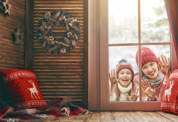 istock family on snowy winter walk 882856042