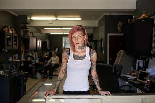 Shot of a tattoo artist at work