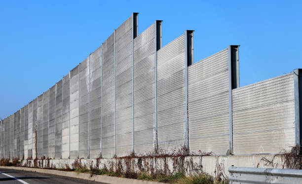 istock Noise barriers to Install by the roadside 882859592