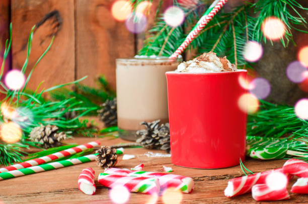 istock Hot cocoa with marshmallows on wooden background 882859604