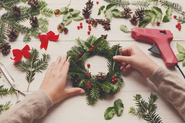 istock Prepare for xmas, creative craft wreath. Making christmas wheath 882860154