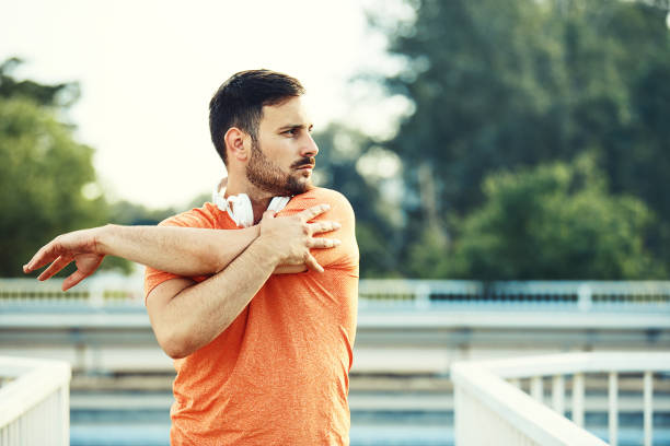 istock Sportive Young Man Exercising 882860238