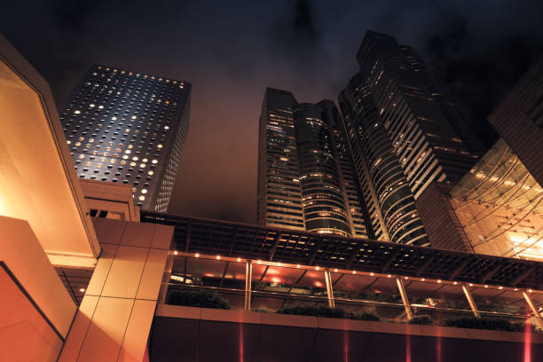 istock Modern city at night. Dark skyscrapers, 882860288
