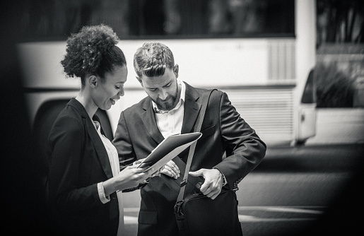 Business People Discussing on The Street