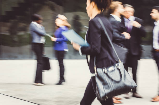 istock Businesswoman Walking, Talking on Phone 882865564