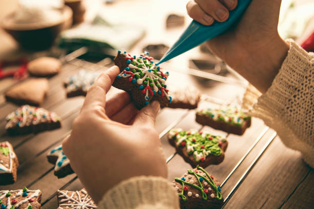 istock Decorating Baked Gingerbread Christmas Cookies 882866482