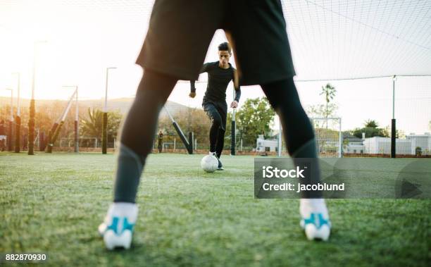 Soccer Players During Team Practice Stock Photo - Download Image Now - Soccer, Manager, Soccer Ball