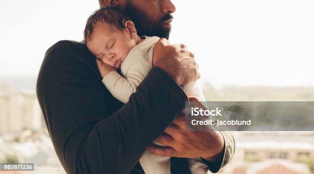 Newborn Baby Boy In His Fathers Arms Stock Photo - Download Image Now - Father, Baby - Human Age, Newborn
