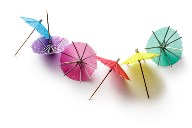 Party: Drink Umbrellas Isolated on White Background Party: Drink Umbrellas Isolated on White Background drink umbrella stock pictures, royalty-free photos & images