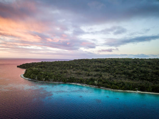 Vanuatu Efate Island Sunset Aerial View Port Villa Beautiful aerial drone point of view towards the blue coral island lagoon of the Moso Islet close to Efate Main Island, Vanatu, Pacific Ring of Fire, South Pacific. vanuatu stock pictures, royalty-free photos & images