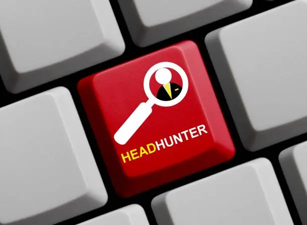 Red Computer Keyboard with Magnifier Symbol showing Headhunter