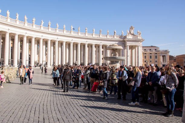 Pilgrims during Urbis et Orbis prayer Vatican, November 19, 2017: Pilgrims during Urbis et Orbis prayer on Sunday at Saint Peters Square. orbis stock pictures, royalty-free photos & images