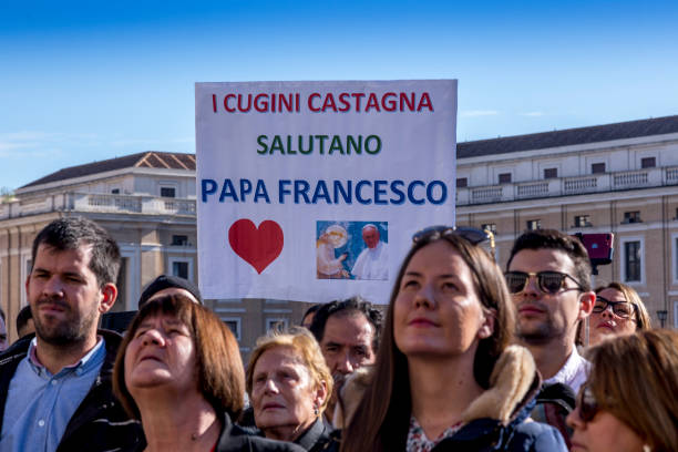 Pilgrims during Urbis et Orbis prayer Vatican, November 19, 2017: Pilgrims during Urbis et Orbis prayer on Sunday at Saint Peters Square. orbis stock pictures, royalty-free photos & images
