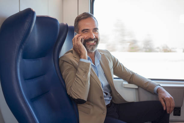 istock Mature businessman in train 882901990
