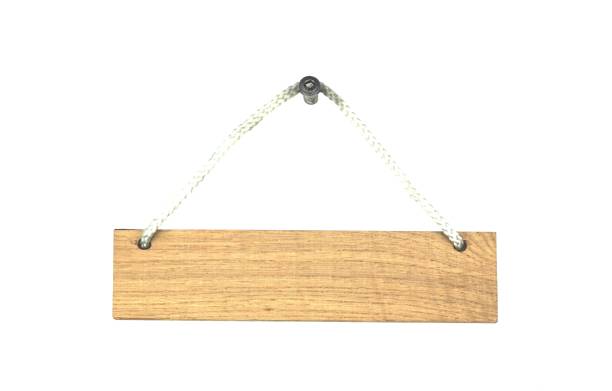 istock Old wooden sign with white rope 882902366