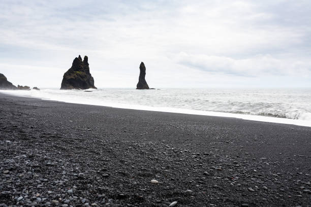 istock view of Reynisdrangar basalt rocks in Iceland 882902496