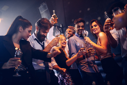 Group of friends having fun at the nightclub