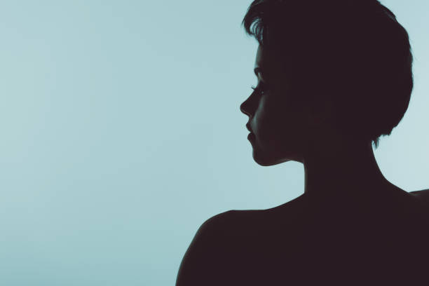 istock silhouette of beautiful woman 882906526
