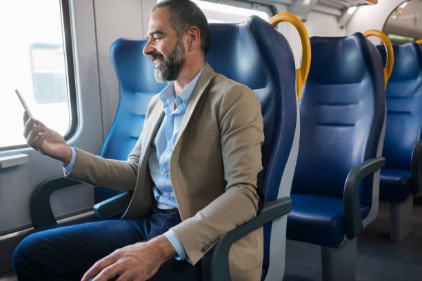 istock Mature businessman in train 882934578