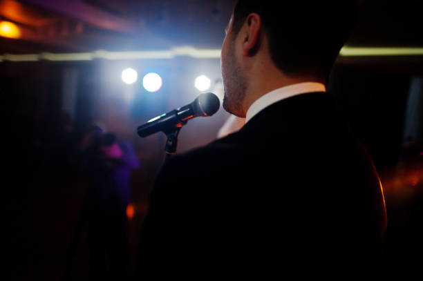 istock Musicial music live band performing on a stage with different lights. 882956992