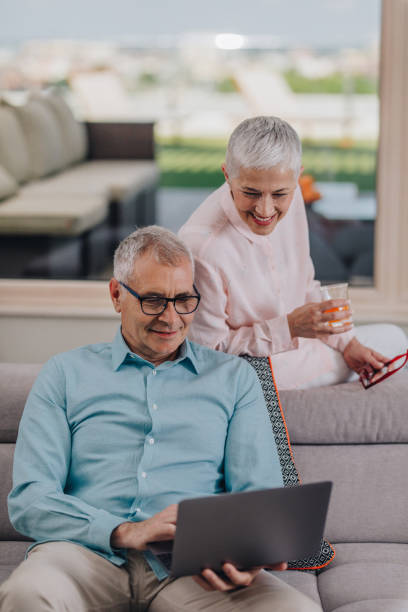 istock What are you searching for on the Internet honey? 882979764