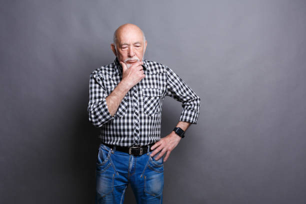 istock Pensive mature man looking away, copy space 882984208