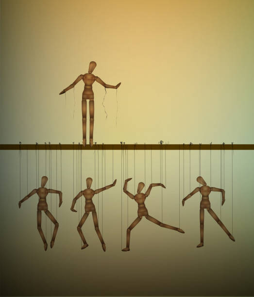 istock be free concept, one marionette without the thread and many marionettes hanging, 882984712
