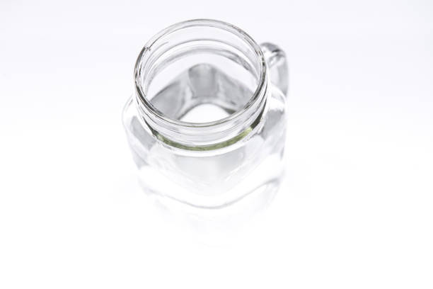 istock vintage mason jar with water on White background 882991552