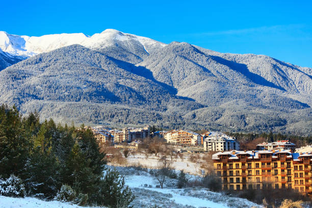 istock Houses and snow mountains in Bansko, Bulgaria 882991610