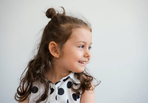 istock Cute little girl portrait 882993682
