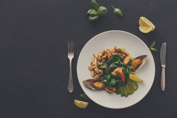 istock Warm salad with grilled seafood flat lay 882993704
