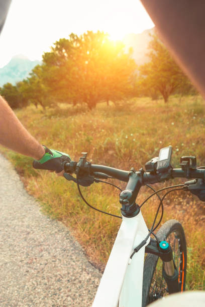 istock sunset on mountain bike 882995744