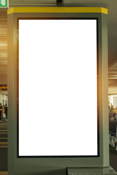 istock Blank billboard advertising panel in terminal airport, Mock up white screen, insert for text of customer. Space for texting in products or promotional at airport,train station,advertising public commercial. 882998800