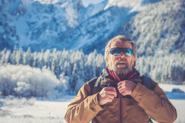 istock Senior Mountaineer in Alps, Winter 883000592