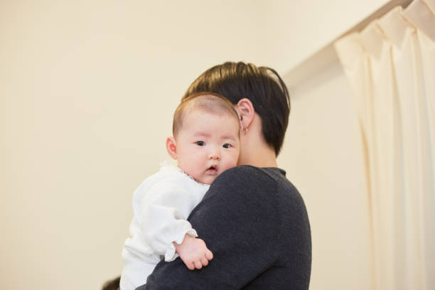 ママ持株赤ちゃん - 産後うつ 日本人 ストックフォトと画像