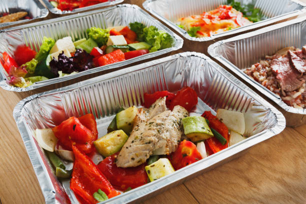 istock Healthy food in boxes, diet concept. 883032132