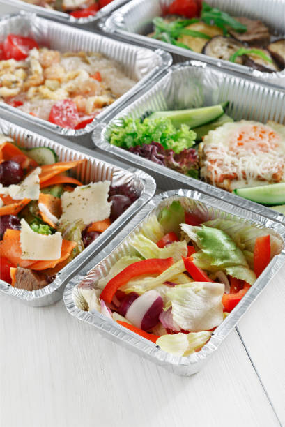 istock Healthy food in boxes, diet concept. 883032188