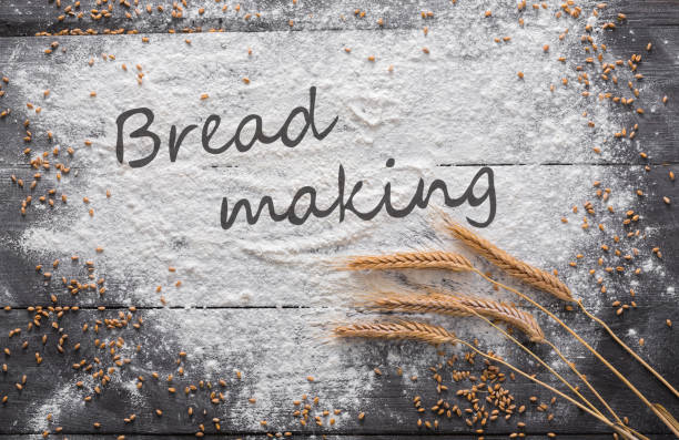istock Baking concept on wood background, sprinkled flour with copy space 883034586