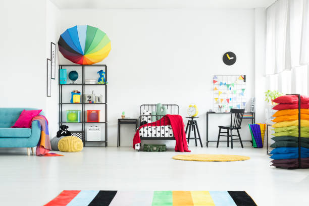 istock Spacious rainbow kid's bedroom 883041322