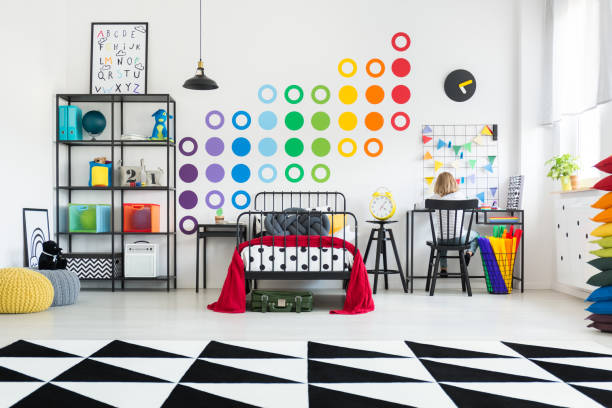 istock Geometric carpet in kid's room 883041346